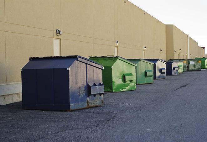 a site supervisor checking a construction dumpster in Antelope